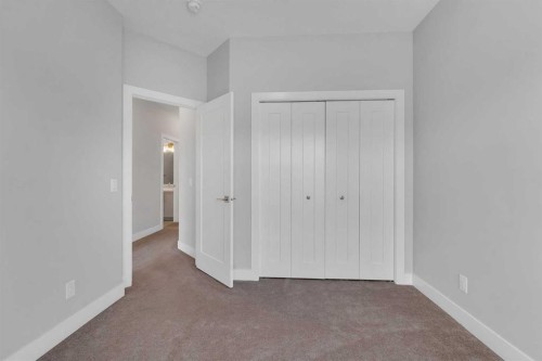 81 Carringvue Manor Nw, Calgary, AB - Indoor Photo Showing Other Room