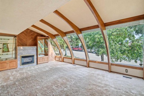 13 Tipton Place Nw, Calgary, AB - Indoor With Fireplace
