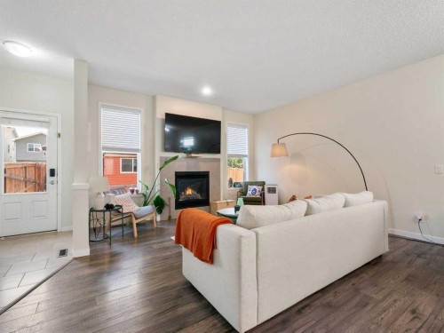 367 Auburn Crest Way Se, Calgary, AB - Indoor Photo Showing Living Room With Fireplace