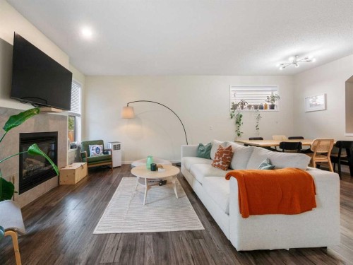 367 Auburn Crest Way Se, Calgary, AB - Indoor Photo Showing Living Room With Fireplace