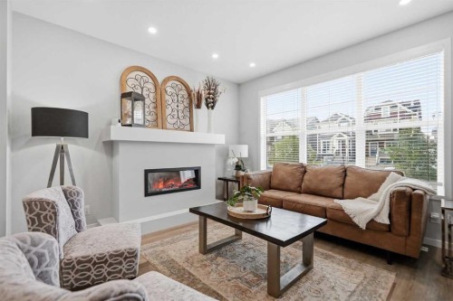 578 Masters Road Se, Calgary, AB - Indoor Photo Showing Living Room With Fireplace