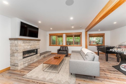 501 5 Street, Canmore, AB - Indoor Photo Showing Living Room With Fireplace