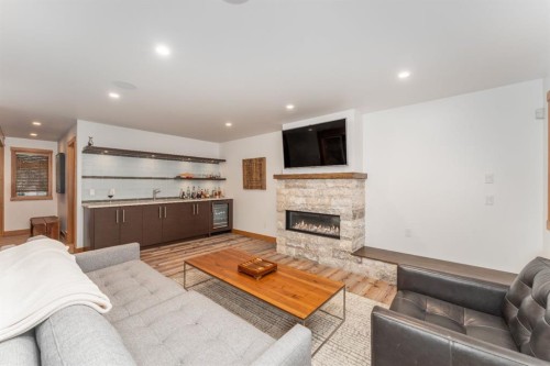 501 5 Street, Canmore, AB - Indoor Photo Showing Living Room With Fireplace
