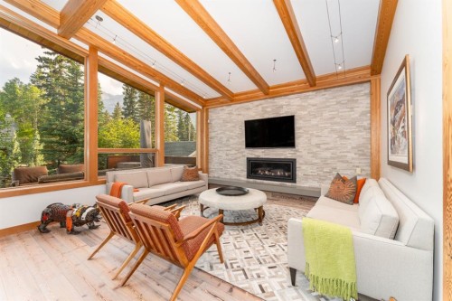 501 5 Street, Canmore, AB - Indoor Photo Showing Living Room With Fireplace