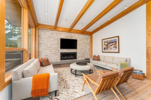 501 5 Street, Canmore, AB - Indoor Photo Showing Living Room With Fireplace