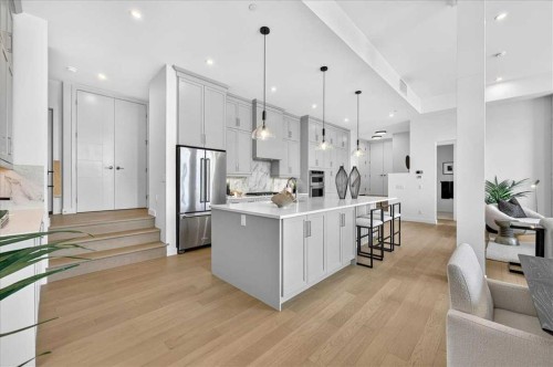 102-150 Marina Cove Se, Calgary, AB - Indoor Photo Showing Kitchen With Stainless Steel Kitchen With Upgraded Kitchen