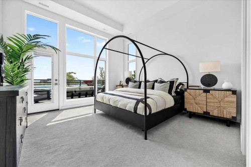102-150 Marina Cove Se, Calgary, AB - Indoor Photo Showing Bedroom