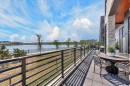 102-150 Marina Cove Se, Calgary, AB  - Outdoor With Body Of Water With View 