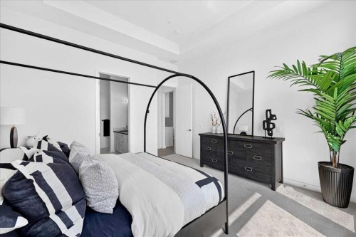 102-150 Marina Cove Se, Calgary, AB - Indoor Photo Showing Bedroom