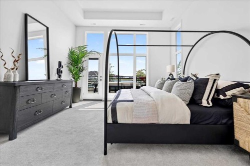 102-150 Marina Cove Se, Calgary, AB - Indoor Photo Showing Bedroom