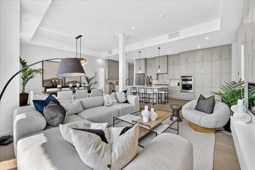 102-150 Marina Cove Se, Calgary, AB - Indoor Photo Showing Living Room