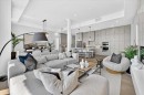 102-150 Marina Cove Se, Calgary, AB  - Indoor Photo Showing Living Room 