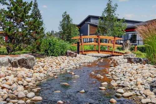 102-150 Marina Cove Se, Calgary, AB - Outdoor With Body Of Water