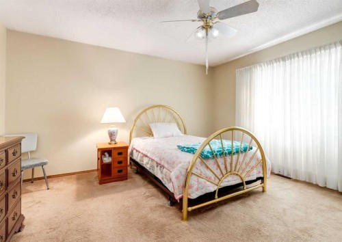7919 Silver Springs Road Nw, Calgary, AB - Indoor Photo Showing Bedroom