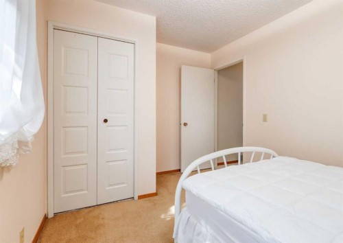 7919 Silver Springs Road Nw, Calgary, AB - Indoor Photo Showing Bedroom