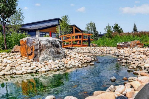 101-150 Marina Cove Se, Calgary, AB - Outdoor With Body Of Water