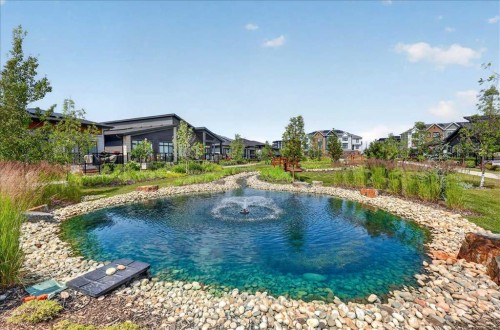 101-150 Marina Cove Se, Calgary, AB - Outdoor With Body Of Water
