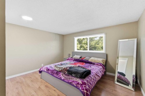 227 Abalone Place Ne, Calgary, AB - Indoor Photo Showing Bedroom