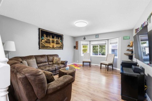 227 Abalone Place Ne, Calgary, AB - Indoor Photo Showing Living Room