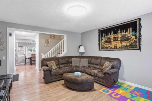 227 Abalone Place Ne, Calgary, AB - Indoor Photo Showing Living Room
