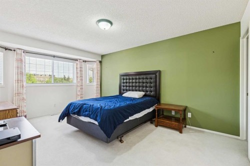 10521 Hidden Valley Drive Nw, Calgary, AB - Indoor Photo Showing Bedroom
