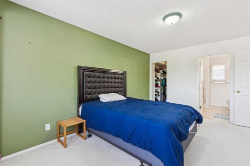 10521 Hidden Valley Drive Nw, Calgary, AB - Indoor Photo Showing Bedroom