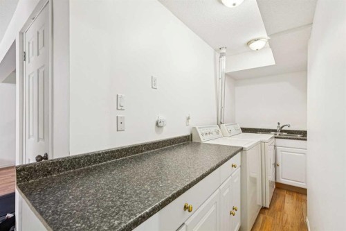 10521 Hidden Valley Drive Nw, Calgary, AB - Indoor Photo Showing Laundry Room