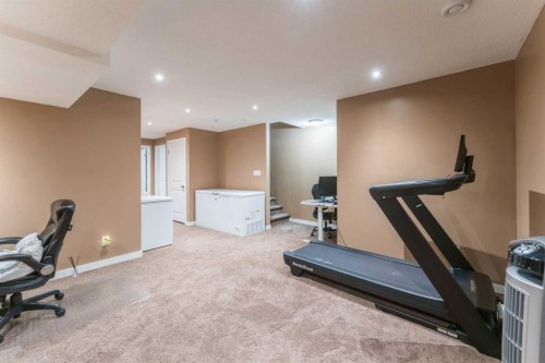 57 Sage Bank Grove Nw, Calgary, AB - Indoor Photo Showing Gym Room