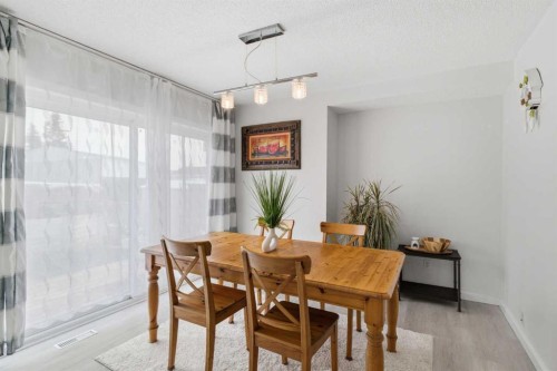 9 Ross Place, Crossfield, AB - Indoor Photo Showing Dining Room