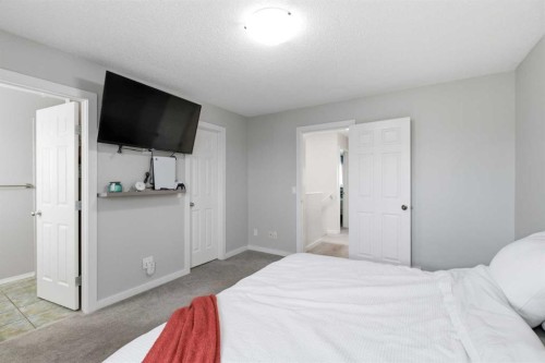 9 Ross Place, Crossfield, AB - Indoor Photo Showing Bedroom