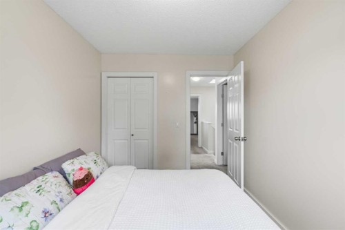 9 Ross Place, Crossfield, AB - Indoor Photo Showing Bedroom