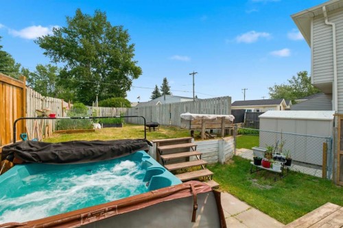 9 Ross Place, Crossfield, AB - Outdoor With Backyard