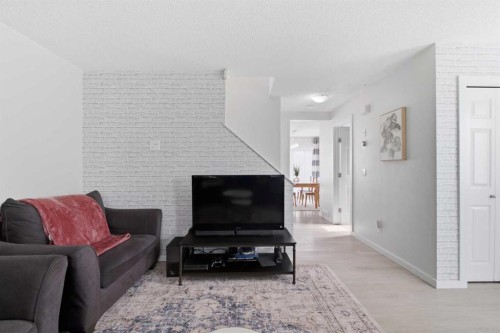 9 Ross Place, Crossfield, AB - Indoor Photo Showing Living Room