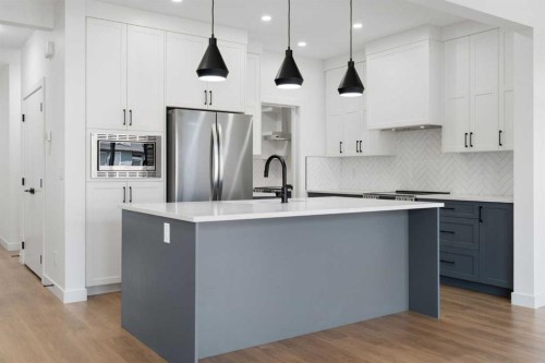12 Copperhead Garden Se, Calgary, AB - Indoor Photo Showing Kitchen With Stainless Steel Kitchen With Upgraded Kitchen