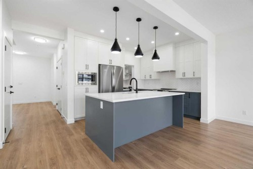 12 Copperhead Garden Se, Calgary, AB - Indoor Photo Showing Kitchen With Upgraded Kitchen