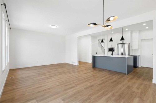 12 Copperhead Garden Se, Calgary, AB - Indoor Photo Showing Kitchen With Upgraded Kitchen