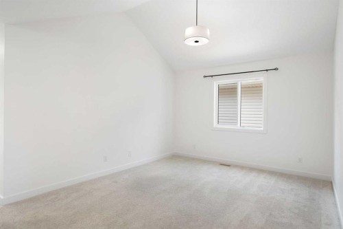 12 Copperhead Garden Se, Calgary, AB - Indoor Photo Showing Other Room