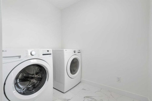 12 Copperhead Garden Se, Calgary, AB - Indoor Photo Showing Laundry Room