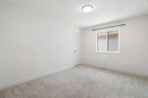 12 Copperhead Garden Se, Calgary, AB - Indoor Photo Showing Other Room