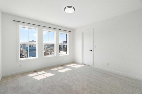 12 Copperhead Garden Se, Calgary, AB - Indoor Photo Showing Other Room