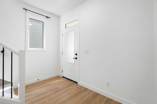 12 Copperhead Garden Se, Calgary, AB - Indoor Photo Showing Other Room