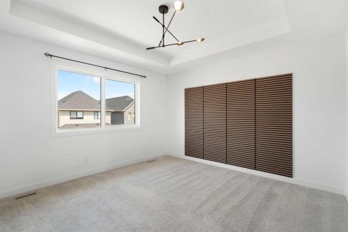 12 Copperhead Garden Se, Calgary, AB - Indoor Photo Showing Other Room