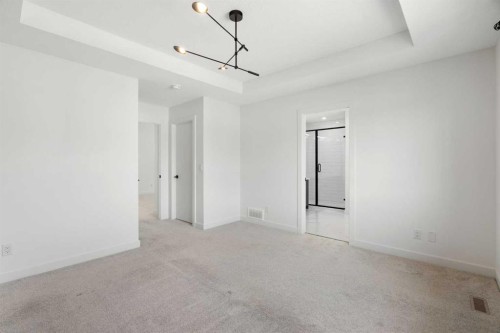 12 Copperhead Garden Se, Calgary, AB - Indoor Photo Showing Other Room