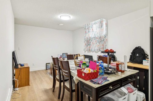 12 Copperhead Garden Se, Calgary, AB - Indoor Photo Showing Dining Room