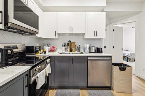 12 Copperhead Garden Se, Calgary, AB - Indoor Photo Showing Kitchen
