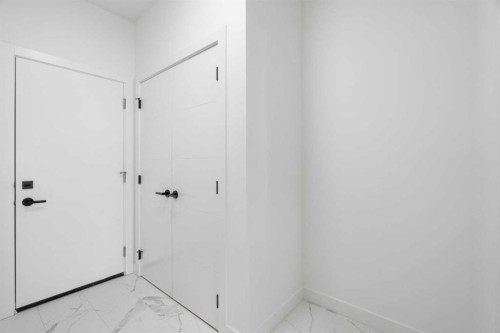 12 Copperhead Garden Se, Calgary, AB - Indoor Photo Showing Other Room