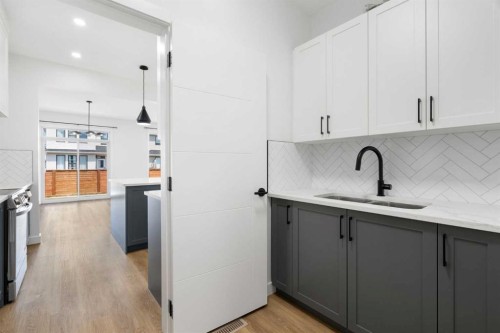 12 Copperhead Garden Se, Calgary, AB - Indoor Photo Showing Kitchen With Double Sink With Upgraded Kitchen