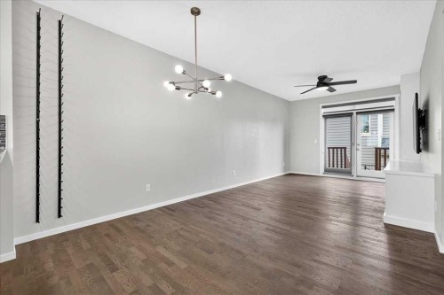 77 Kinlea Way Nw, Calgary, AB - Indoor Photo Showing Other Room