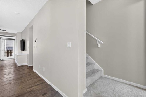 77 Kinlea Way Nw, Calgary, AB - Indoor Photo Showing Other Room