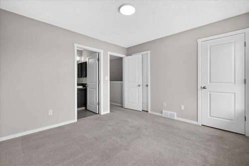 77 Kinlea Way Nw, Calgary, AB - Indoor Photo Showing Other Room